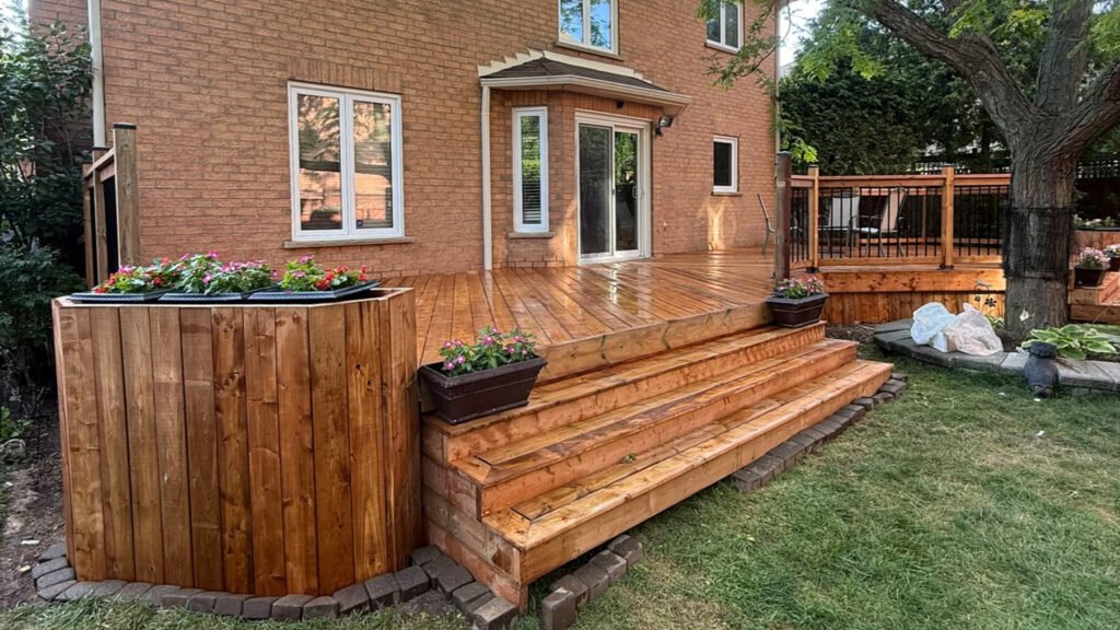 Custom deck and stairs built in a Brampton backyard by Fence & Deck GT